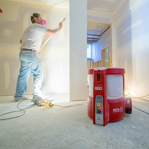 Worker using Build Clean dust cleaning system