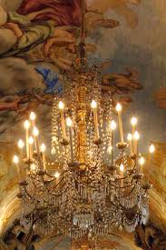 A chandelier made of candlestick-lightbulbs. 